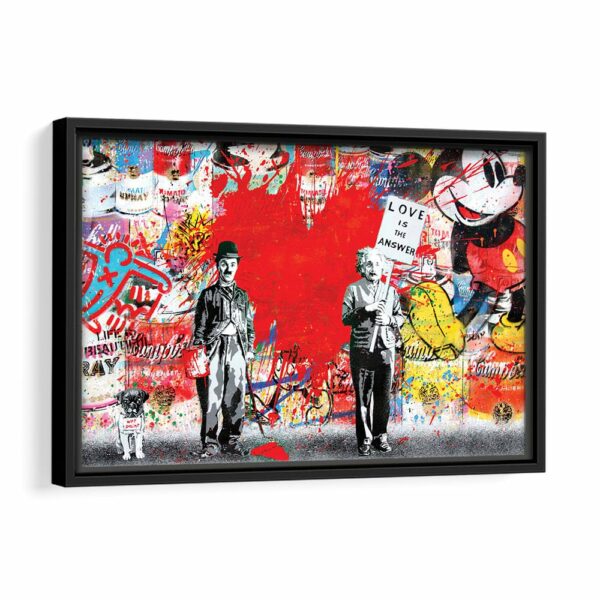 chaplin vs einshtein framed canvas black frame