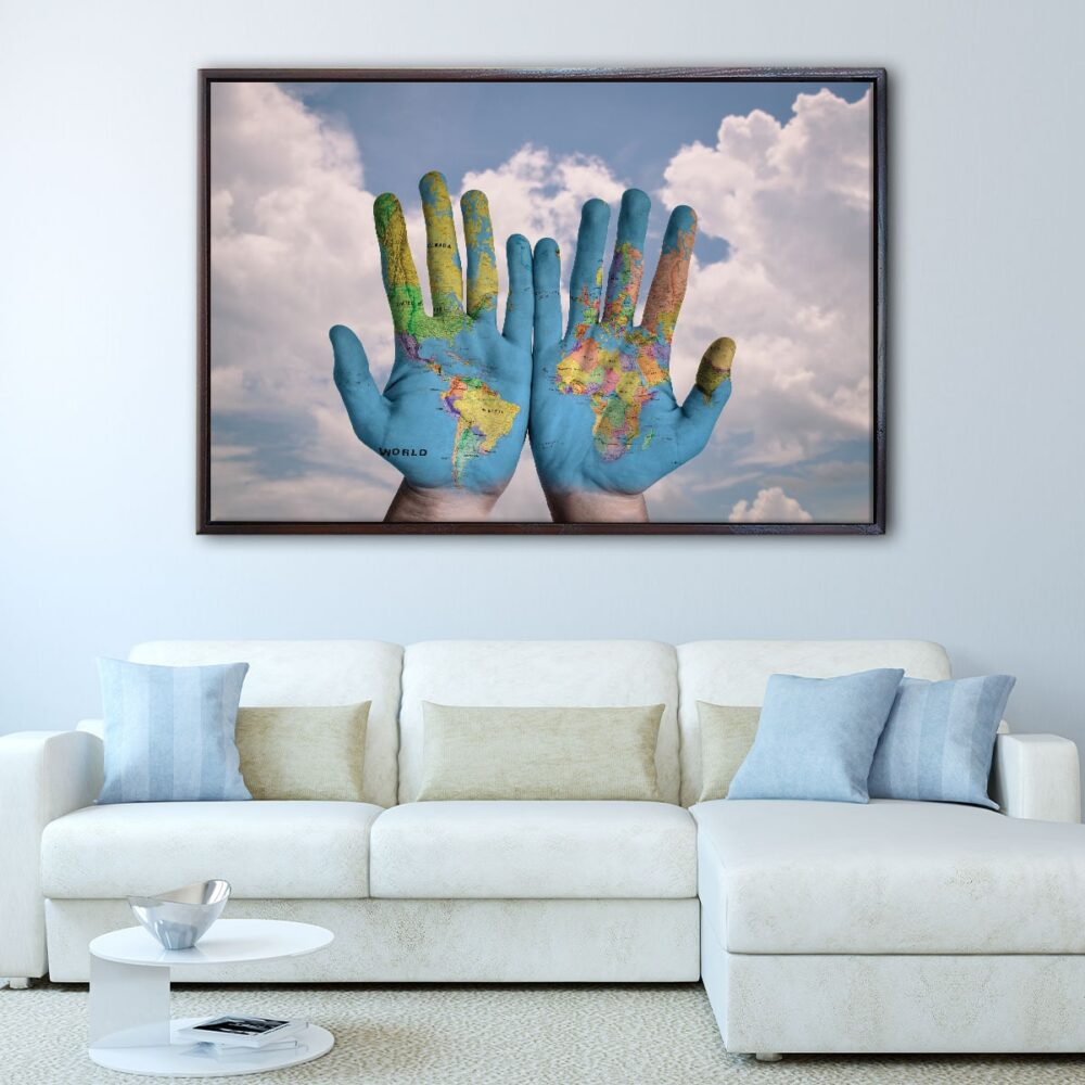 world in hands floating frame canvas