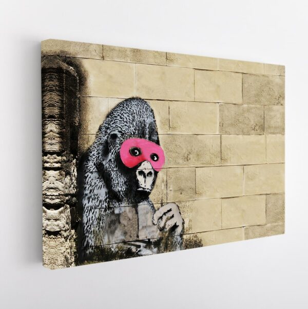 gorilla in a pink mask stretched canvas